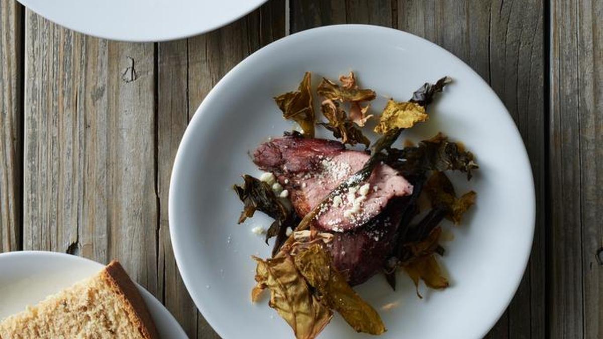 From top: hominy porridge with creasy greens and fatback by Asheville, N.C., chef Matt Dawes; Elliott Moss' smoked and cured pork tenderloin with leather britches and pickled ramps; sorghum bread.
