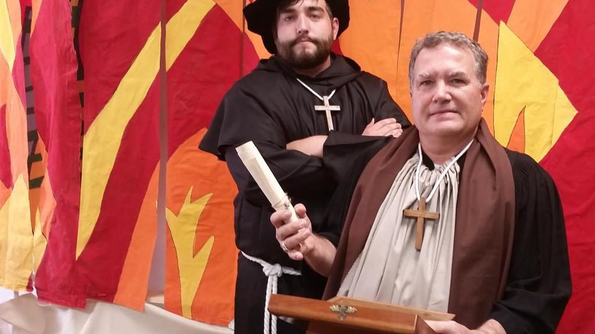 Mount Calvary Lutheran Church Vicar Brad Welik portrays Martin Luther and Rob Crawford the notorious seller of indulgencies, Johann Tetzel, in church’s “Walk Through the Reformation.” It is part of Oktoberfest and Reformation Day festivities presented by area Lutheran congregations.