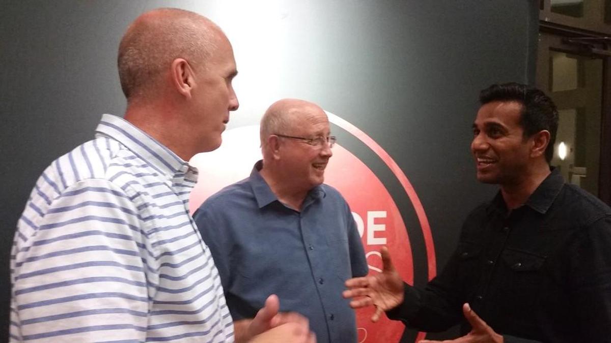 Matt Walls, pastor at Southside Baptist and Southside Kathleen, and his father Jerry Walls, talk with Sujo John after a recent service. John heads an anti-human trafficking ministry “You Can Free Us” Southside partners with.
