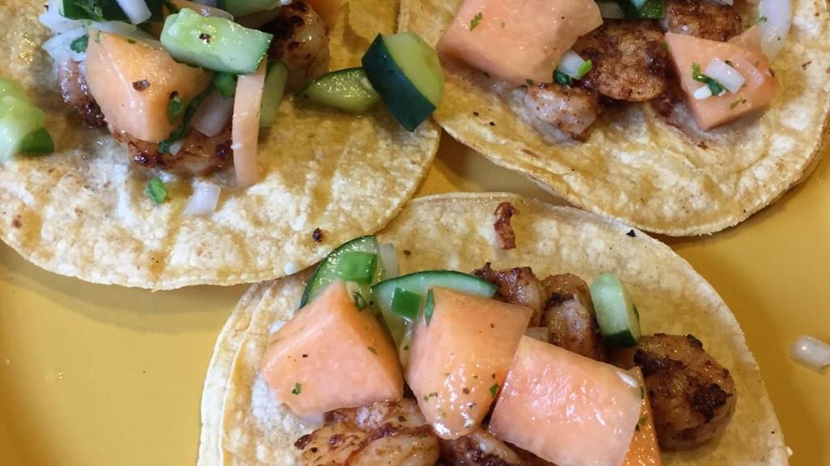 Cantaloupe salsa is served with Seared Shrimp Tacos.