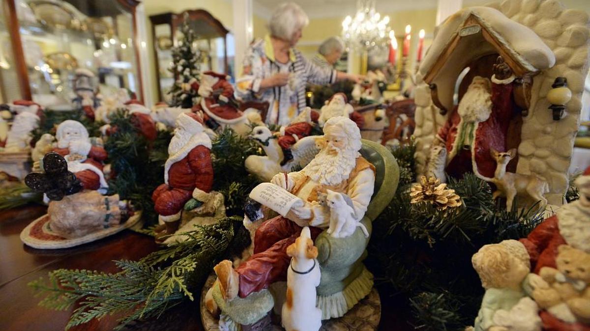 These Santa figurines are among the Christmas decorations in the dining room at Phyllis Farmer’s north Macon home.