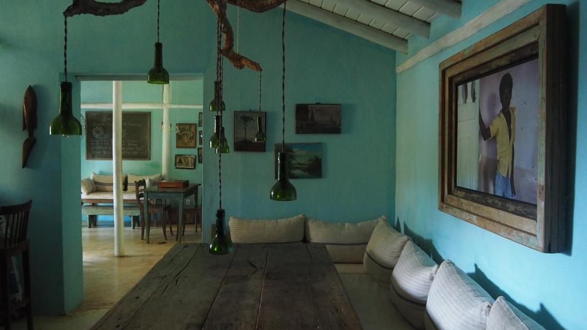 Turquoise colored walls, reminiscent of the ocean, set the perfect tone to showcase work from a wide range of Brazilian artisans at the UXUA Casa Hotel in Trancoso, Brazil.