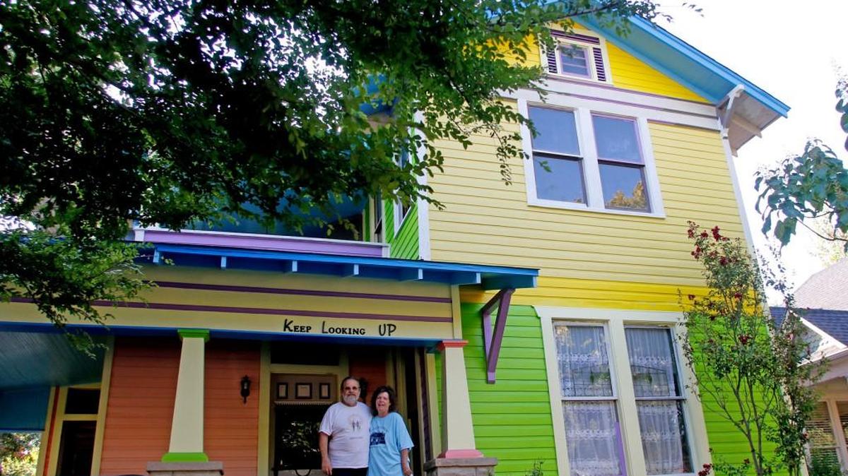 Doug and Nina Dillmann are shown in front of their “Up”-inspired home Sept. 18, 2016, in Fort Worth, Texas.