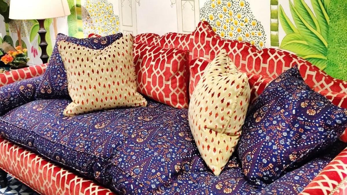 The Rafi day bed by John Robshaw for Duralee uses form and fabric to transform a space.