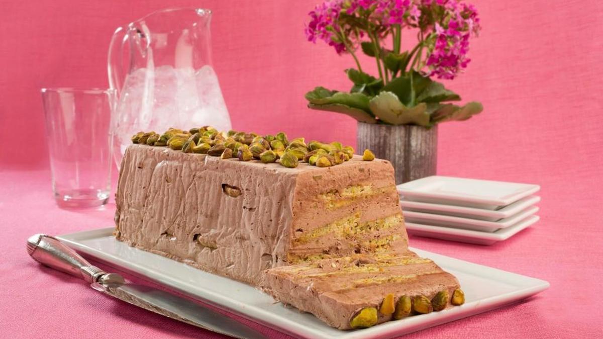 Crisp homemade pistachio wafers form the building blocks of a special icebox cake. More pistachios go into the chocolate whipped cream layered between the cookies.