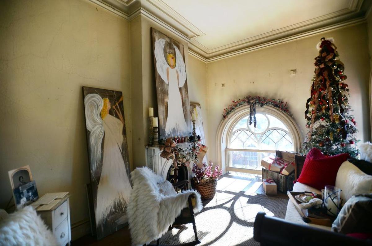 Guardian angels painted by room designer, Dina Deason, in Laura's room.
