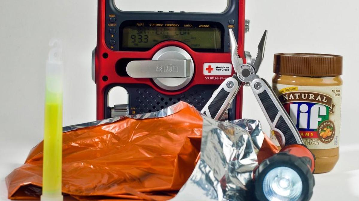 Emergency supplies and a radio make for a survival kit that can help see your family through a disaster.