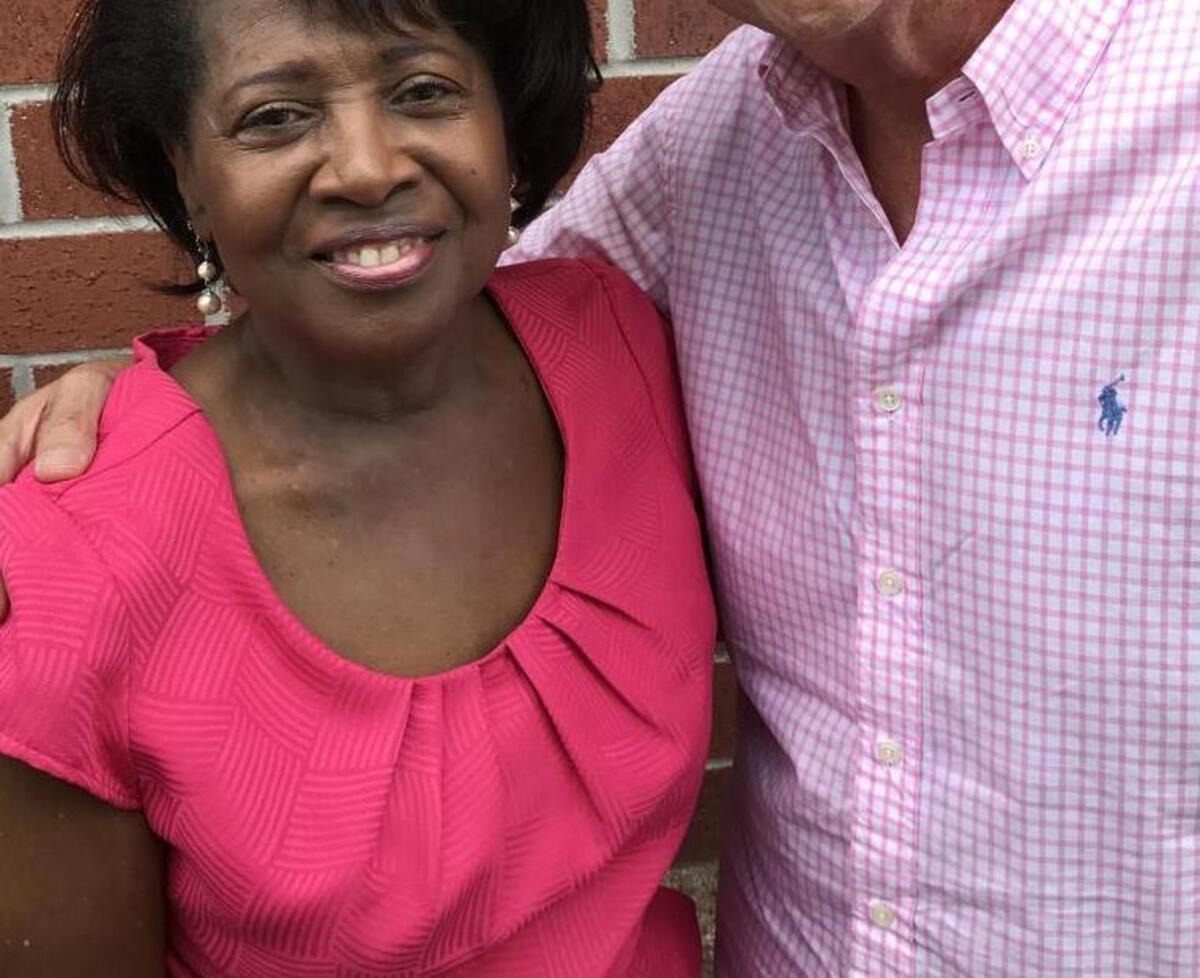 Mark Ballard, right, poses for a photo with his angel, Pat Vickers.
