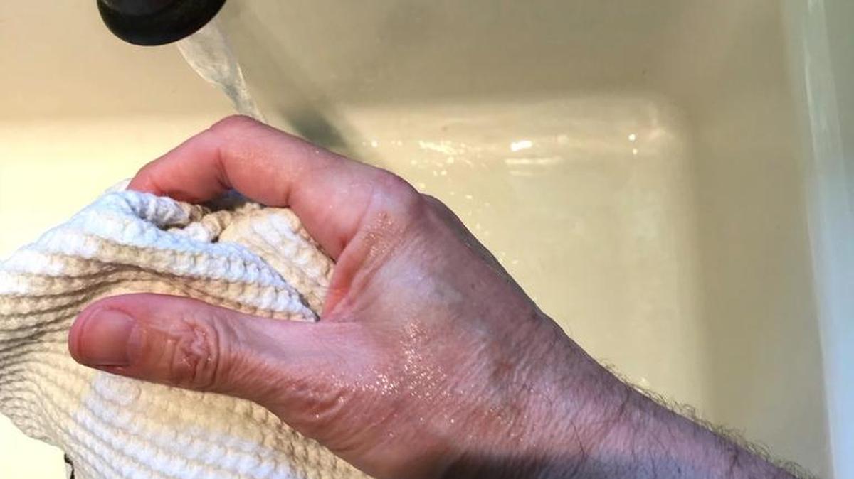 Somewhat of a germaphobe, Mark Ballard likes to keep his hands clean.