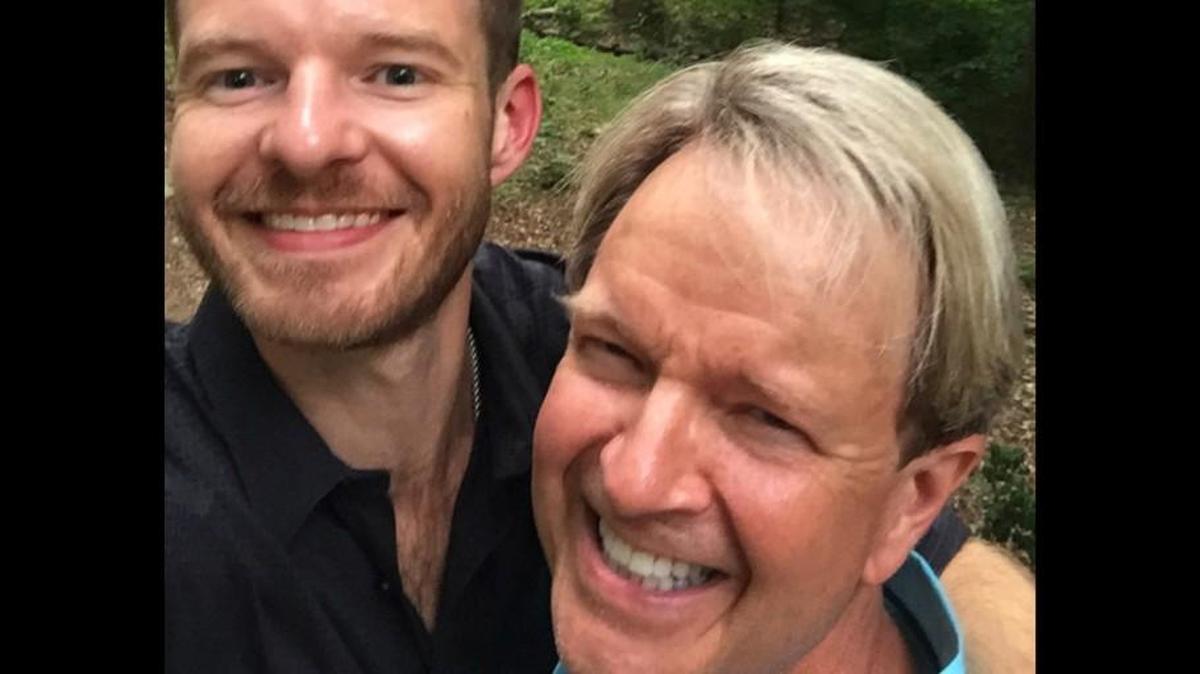 Blake Ballard shares a laugh with his father, Mark.