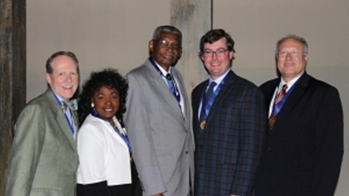(From left to right) Jim Crisp, Gwen and Richard Phillips, Christopher Howard and Dr. Stanley L. Roberts