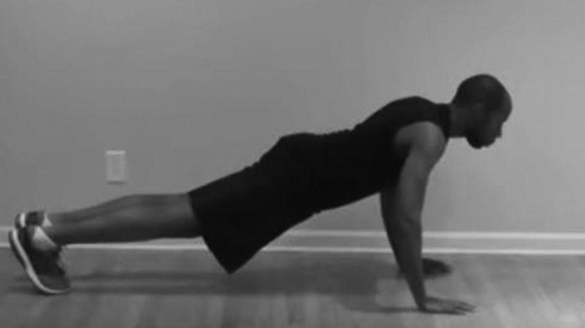 Shawn McClendon demonstrates the proper way to do traditional push ups.