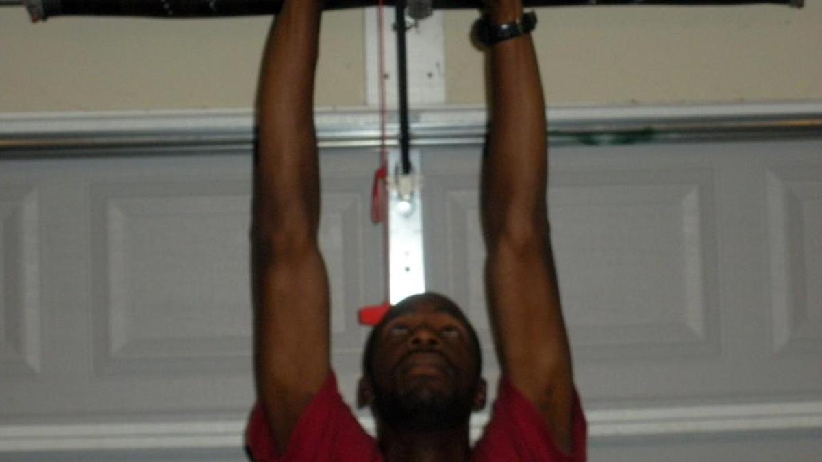 Shawn McClendon demonstrates the Arm and Lat Stretch.