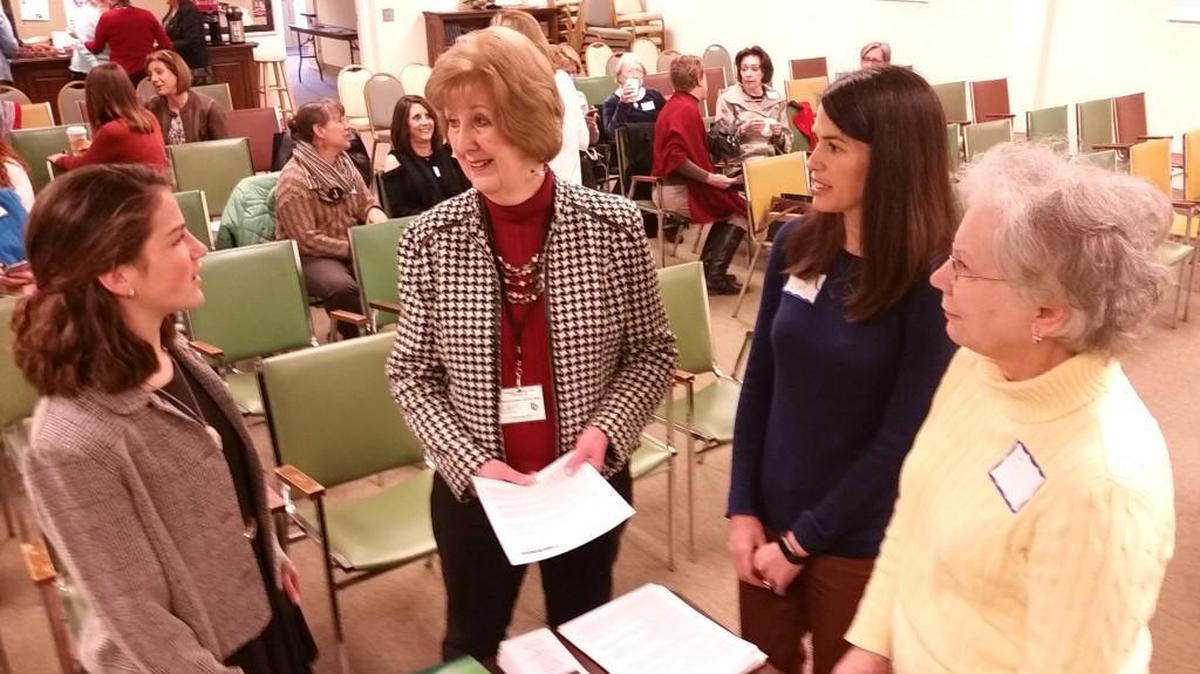 Local anti-human trafficking volunteers Margaret Henry, Beverly Ulrich and Kara Ballard prepare along with Presbyterian Women in the Church representative Diane Elliott before January's annual PresWIC gathering. The women spoke to the group about their volunteer experiences and local opportunities to help fight human trafficking and commercial sexual exploitation and to work in the aid of victims.