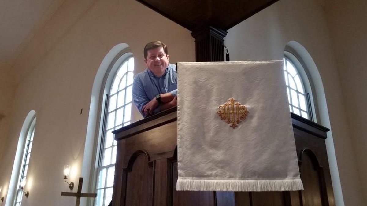 The Rev. Chip Strickland of Riverside United Methodist Church said he enjoys injecting humor into sermons and avoiding stuffiness — even while preaching form Riverside’s raised pulpit.