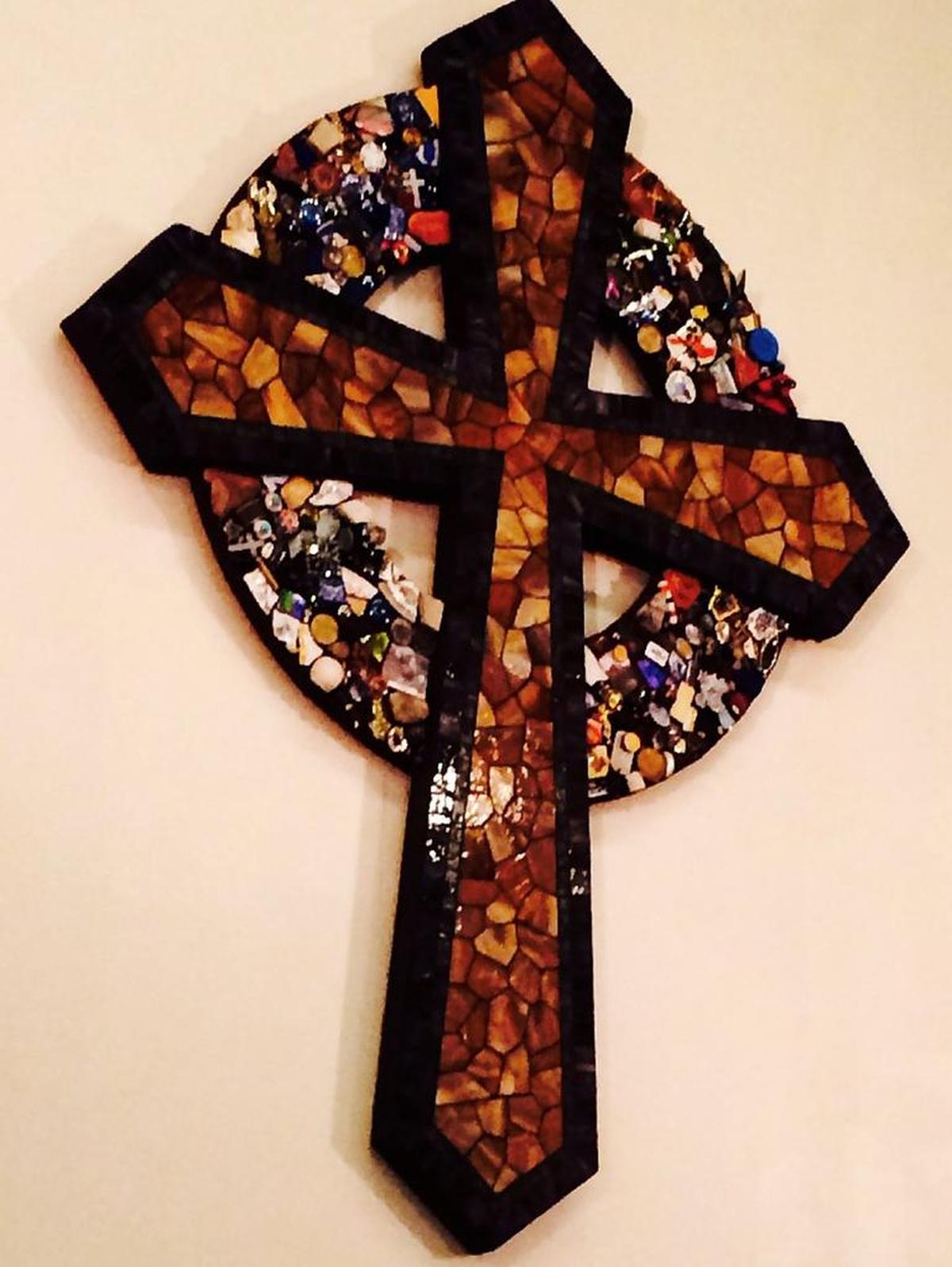 A cross made for the congregation including bits and pieces of materials they supplied is central to the décor and philosophy of Centenary United Methodist Church’s restoration.