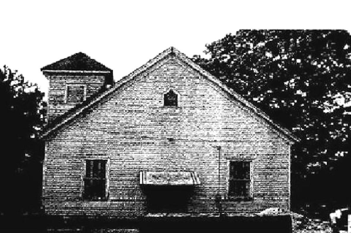 The original wooden Bradley Baptist Church building built in 1898.