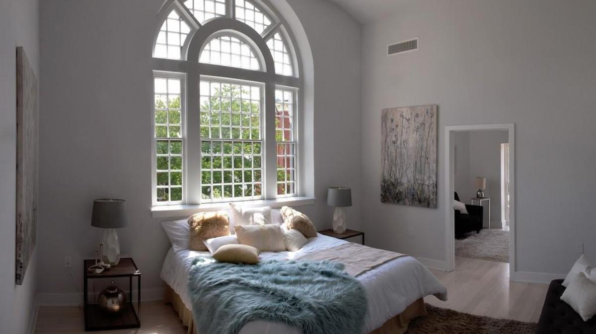 Alexander Memorial Baptist Church, in the Georgetown neighborhood of Washington, was turned into Alexander Hall condominiums. This is a master bedroom in one of the units.