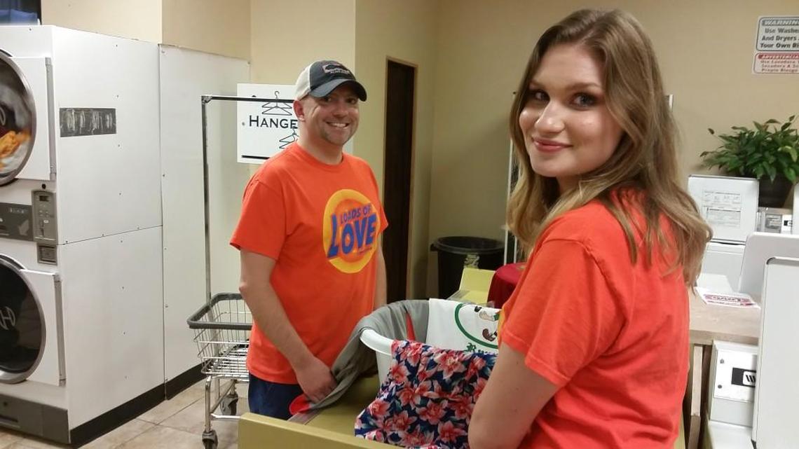Chris Graham, 17-year-old Loads of Love founder, Caroline Gowan and other volunteers, did loads of laundry at this month’s outreach on Moody Road.