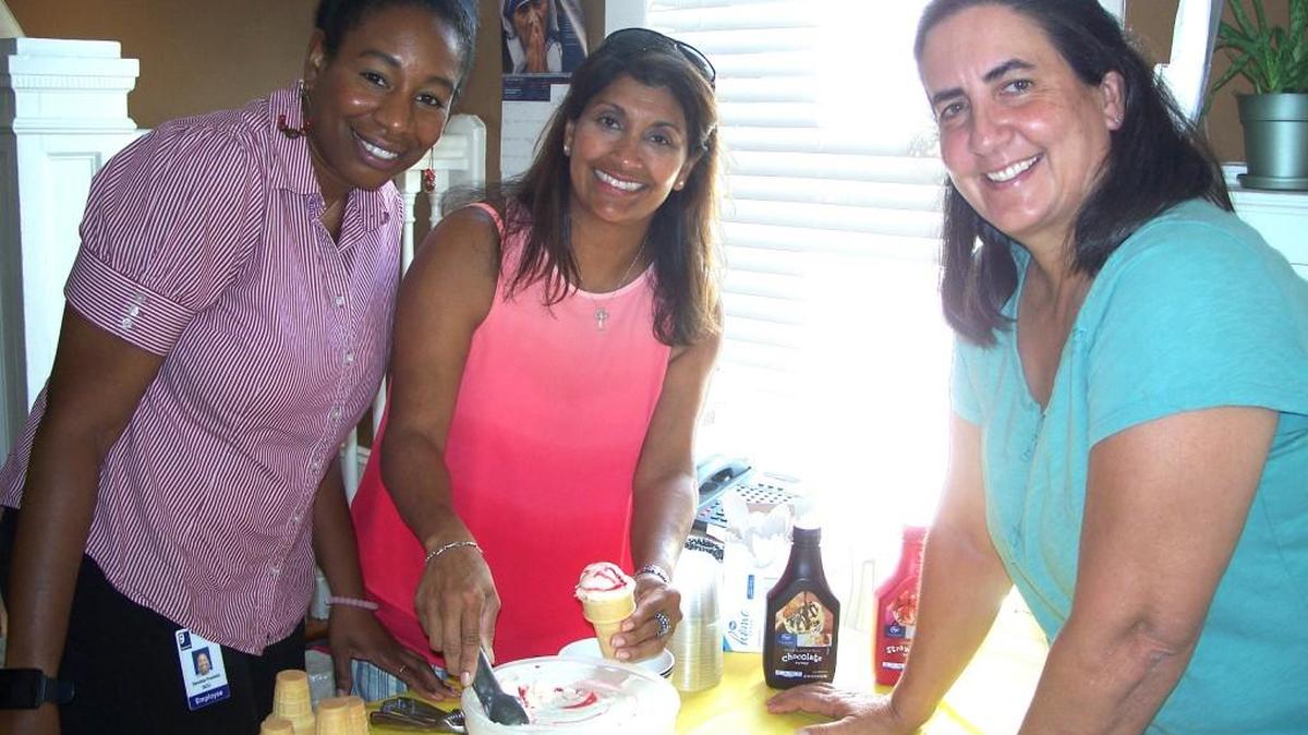 Denisia Franklin, Family Advancement Ministries board member, Sachie Thorne, assistant director, and Chris McKowen, office manager, served ice cream at a get-to-know-us ice cream social Sept. 20-22 at the ministry’s offices.