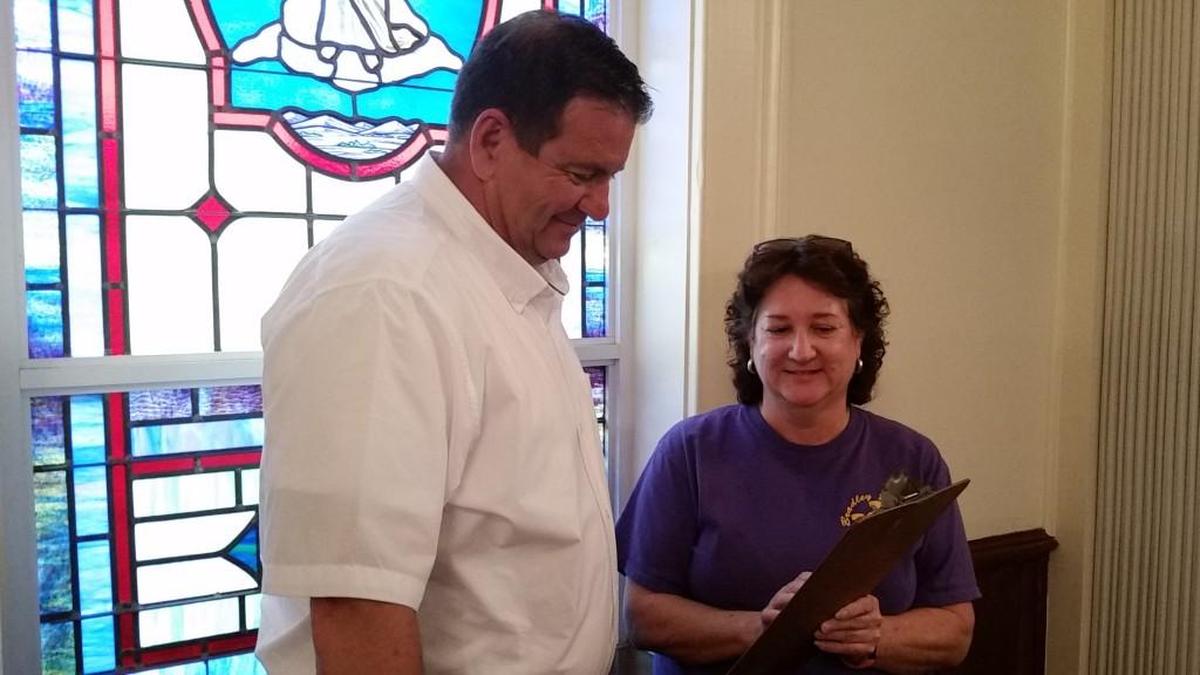 Steve Johnson and Jan Greene of Bradley Baptist Church check plans for an Oct. 14 community celebration of the church’s 120 anniversary.