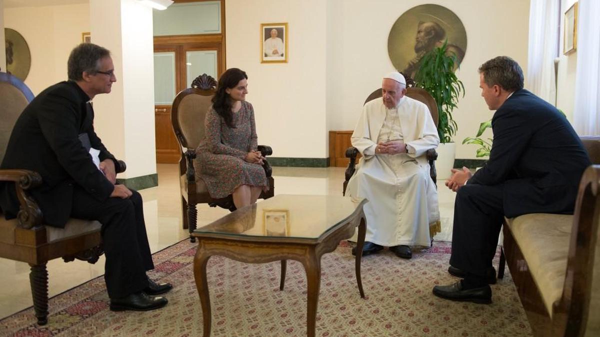 Pope Francis meets Monday with Paloma Garcia Ovejero, left, and Greg Burke, right, at the Vatican. The pontiff named Burke, a former Fox TV correspondent, to replace his spokesman and tapped Paloma Garcia Ovejero, of Spain, to be Burke’s deputy.