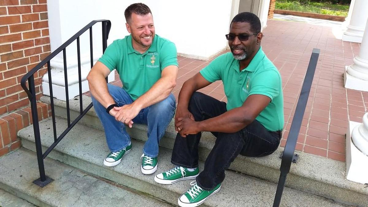 The Rev. Baxter Hurley and the Rev. Bruce Burns on the steps of One Step at Ingleside, home to the collaborative gatherings the two pastors and their congregations have begun to foster multiracial worship and fellowship.