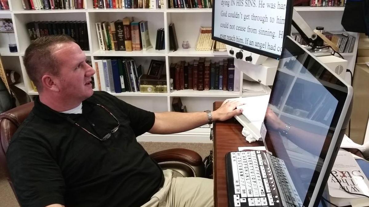 Chris L. Dotson, new pastor at Porterfield Baptist Church, said he came to the church to serve it and the community by loving people and being faithful to God’s word. Dotson has suffered from an optic nerve disorder since birth that requires him to use special glasses and devices to see and to read and study.