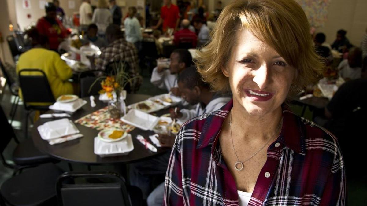 Rescue Mission of Middle Georgia President and CEO Erin Reimers is seen at the group’s Thanksgiving Day meal Nov. 24.