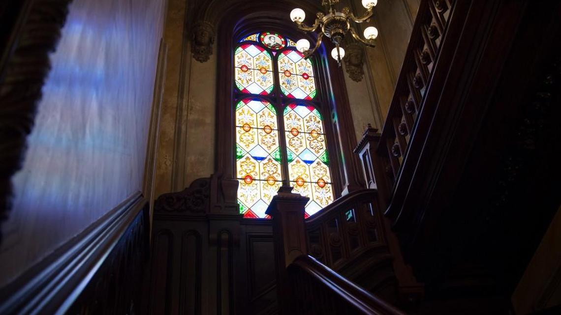 Light shines through the "Lord Byron" window at the Hay House on Monday.