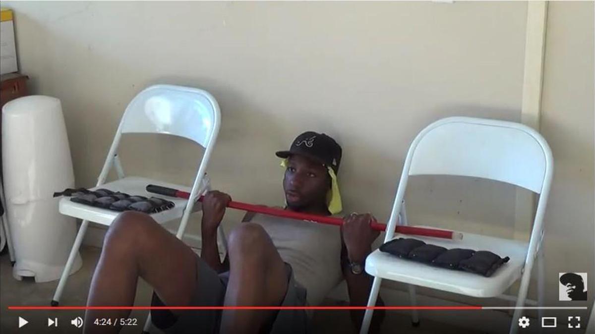 Shawn McClendon demonstrates a “broomstick” chin-up on YouTube.