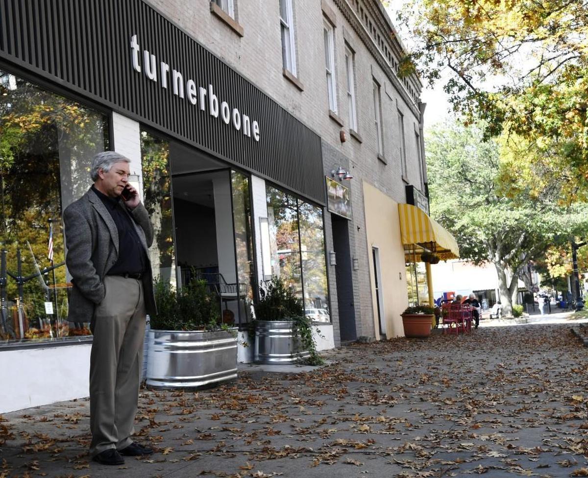 Terry Berding stands outside of turnerboone on Cherry Street.