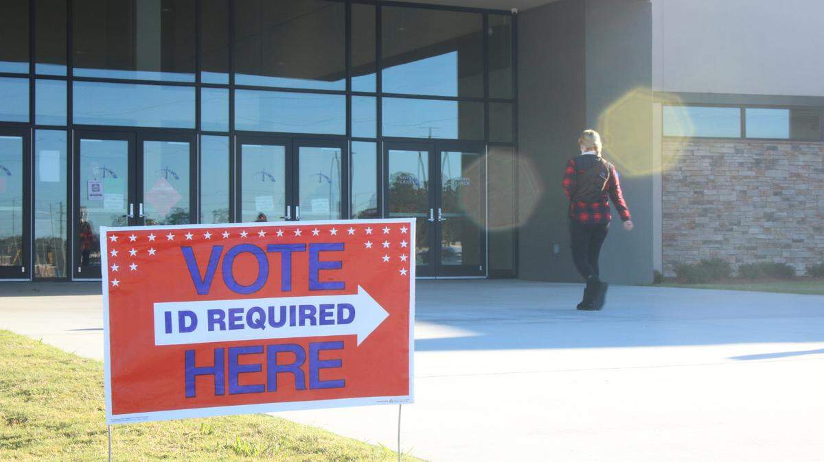 A voter enters a Georgia polling place last November. On March 3, a sweeping expansion of federal voting rights pushed by Democrats passed along party lines in US House amid national debate about Republican efforts to clamp down on ballot access.