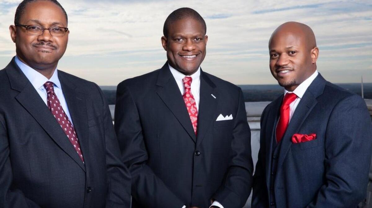 Quinton Seay, Eugene Felton and Chris Stewart, left to right, are law partners at Atlanta-based Stewart, Seay & Felton trial attorneys. The firm is opening an office on Vineville Avenue in Macon.