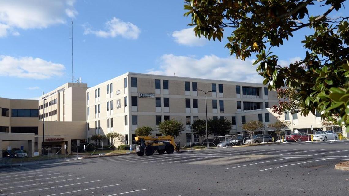 A section of the Coliseum Medical Centers’ parking lot on Coliseum Drive in Macon was blocked off Tuesday with temporary fencing. The hospital is expanding its emergency room and adding a helipad.