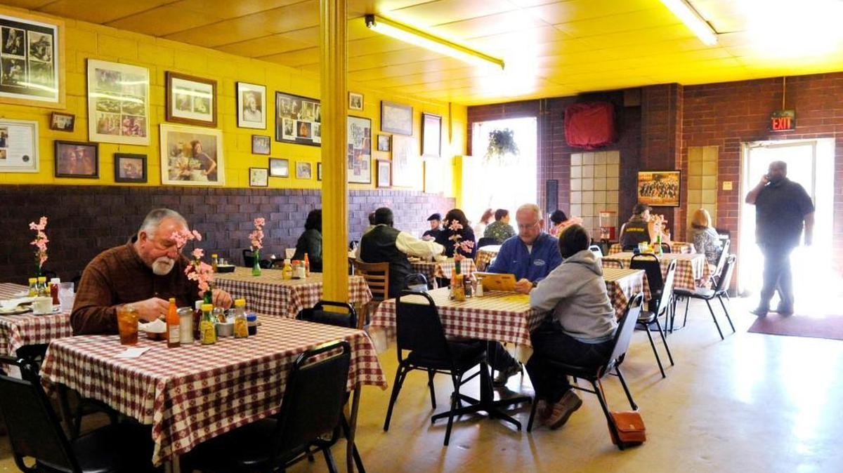 In this file photo, people eat at the H&H Restaurant at lunch time in 2012. The Moonhanger Group owns The Rookery, Dovetail, H&H and Natalia’s.