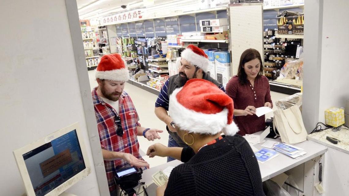 Members of the Layaway Santa group help payoff layaways at the Macon Kmart in 2016.