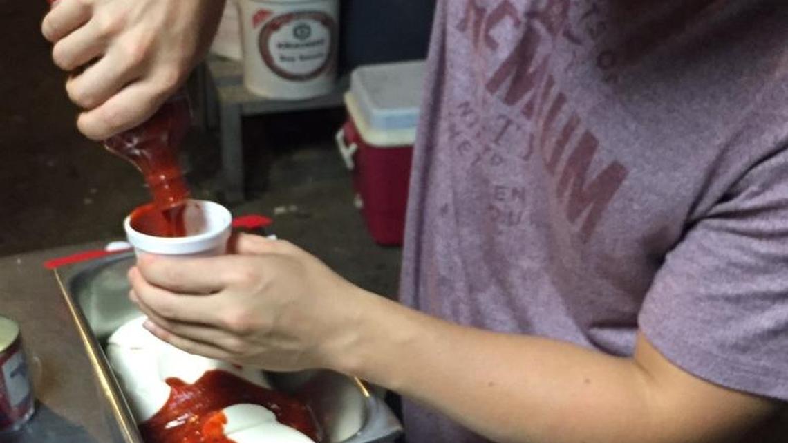 Kevin Zhang, owner and chef of EverFresh Meals LLC, prepares Greek yogurt and Sriracha-based Southwest chipotle that’s used in its Southwest Burrito Bowls.
