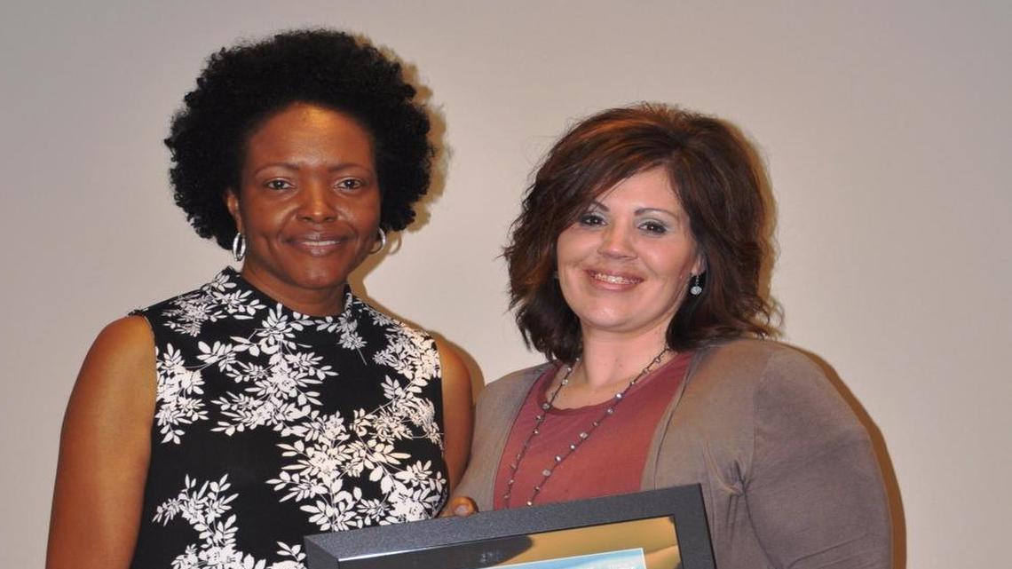 Diadra Biles from the American Heart Association and American Stroke Association presents the 2017 Get with the Guidelines Award to Kristen Ankrom, Stroke Coordinator for Coliseum Medical Centers in Macon