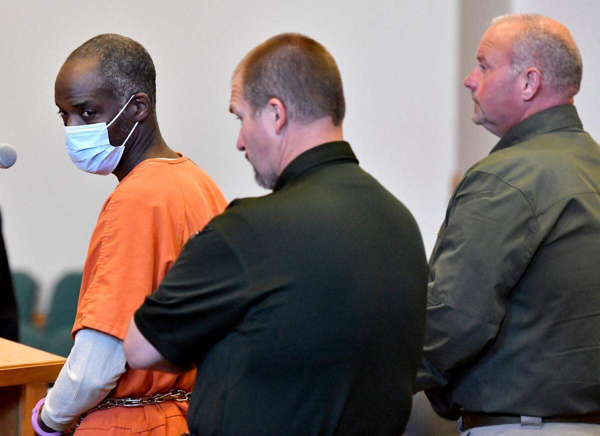 Charles Edward “Bo-Bo” Rowland, left, pleaded guilty to murder last month in the September 2021 shooting deaths of Fred and Peggy White near their Twiggs County home.