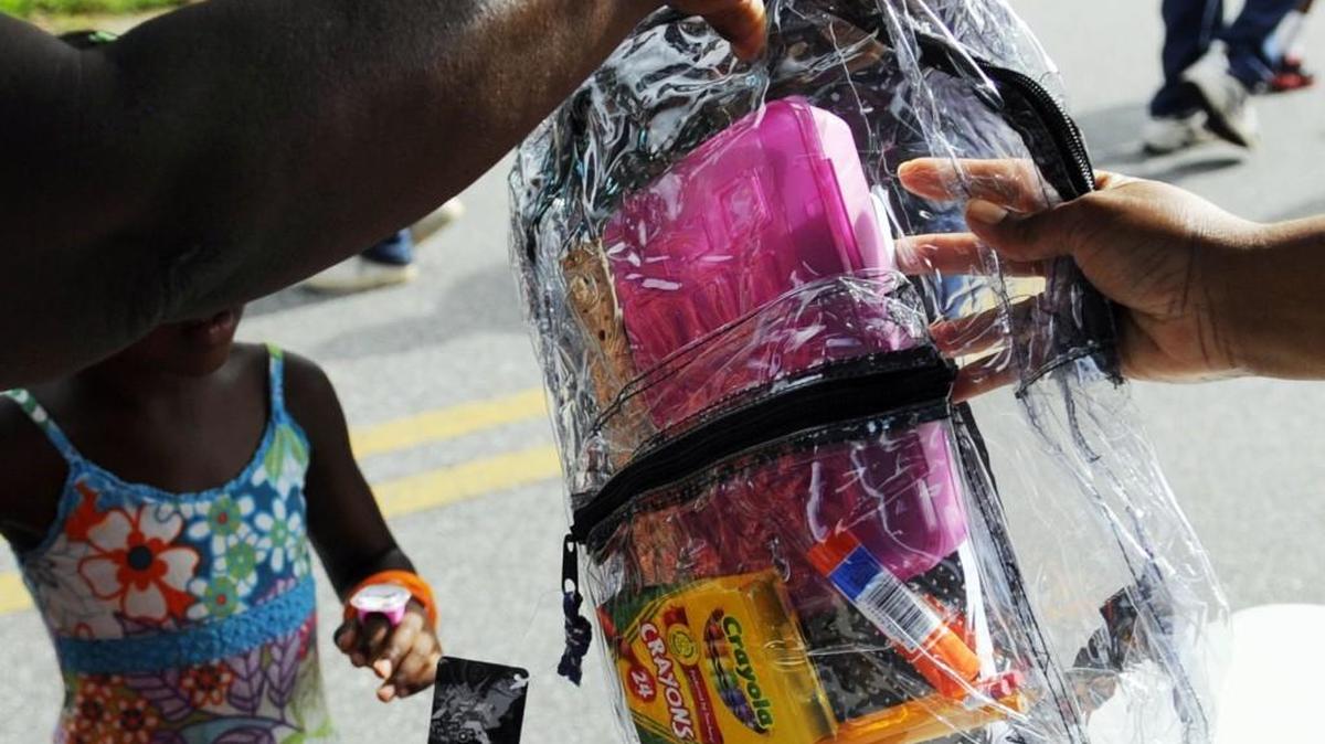 Book bags given out at a midstate Back 2 School Bash, seen in this 2012 file photo, contained school supplies such as paper, pencils, pens, composition books and crayons, depending on the grade of the child.
