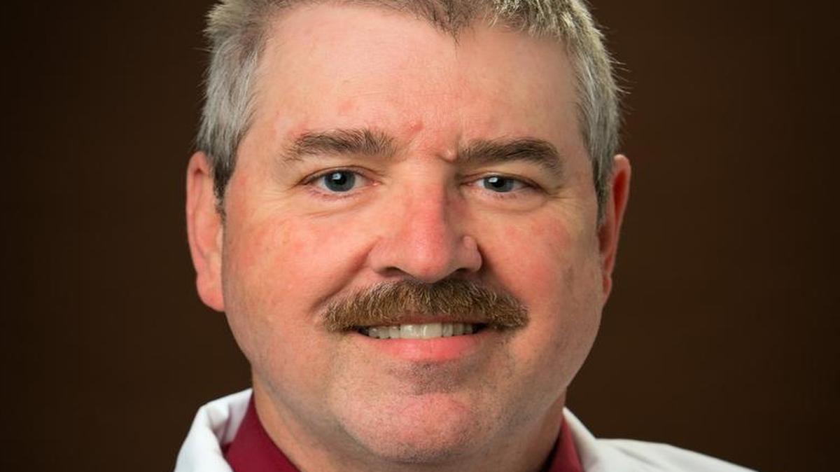 Dr. Michael E. Greene