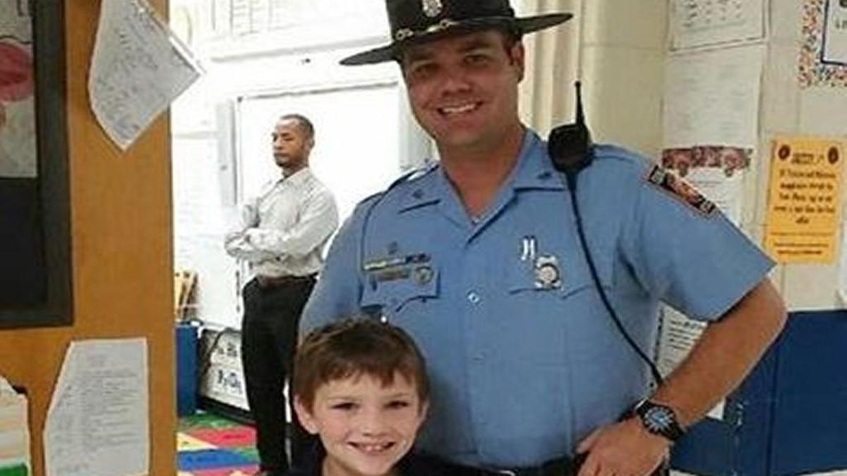 Georgia State TFC Christopher Hosey surprised a little boy at school Monday after rescuing the boy from an overturned vehicle last month.