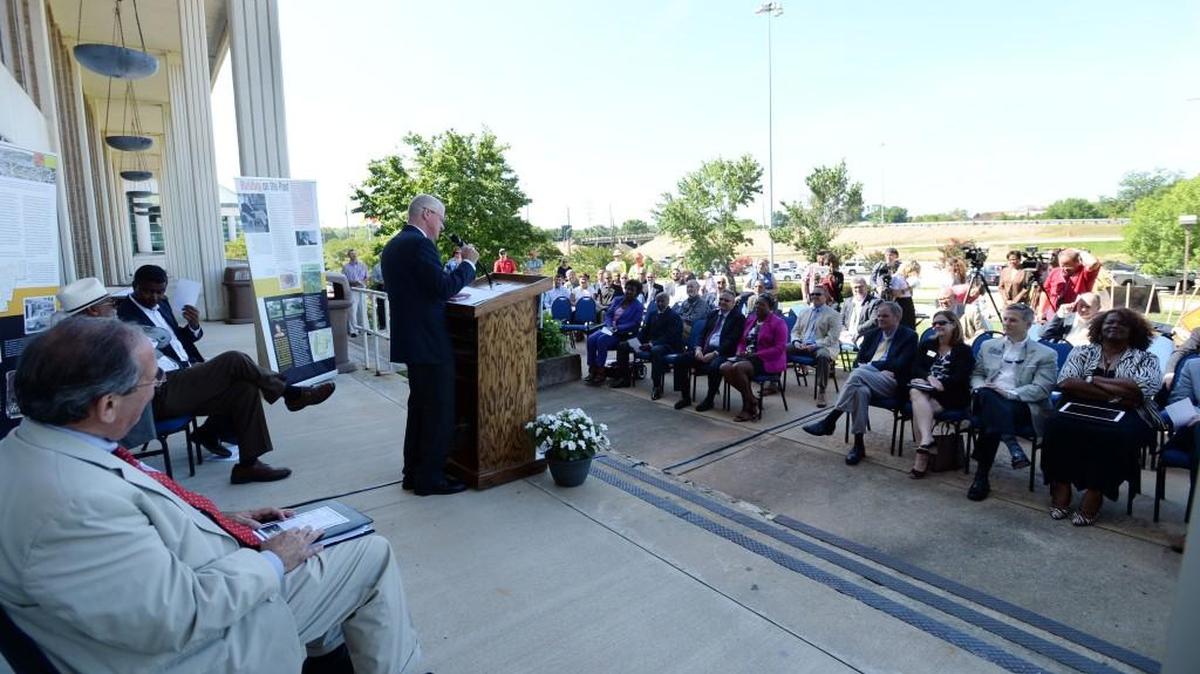 BEAU CABELL/THE TELEGRAPH Macon, Ga., 06/16/2017: Georgia Department of Transportation commissioner Russell R. McMurray addresses a crowd over the roar of interstate traffic on the steps of the Macon Coliseum where he said the improvements to the I-16/I-75 interchange have been a long time coming.