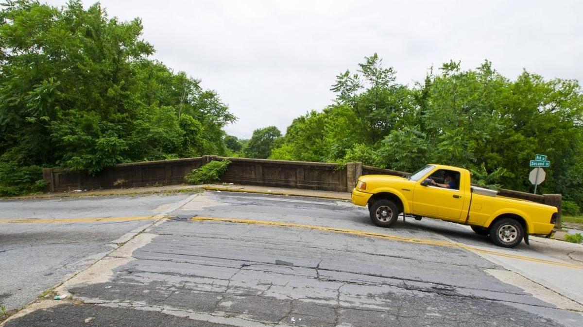 A pickup truck crosses the Hump Bridge on Second Street Tuesday afternoon. Starting Wednesday, Second Street will be closed from Ash Street to the other side of the hump bridge while a road connection project takes place. Construction is expected to be completed in about 60 days. The hump bridge will not reopen after the project is finished, the release said.