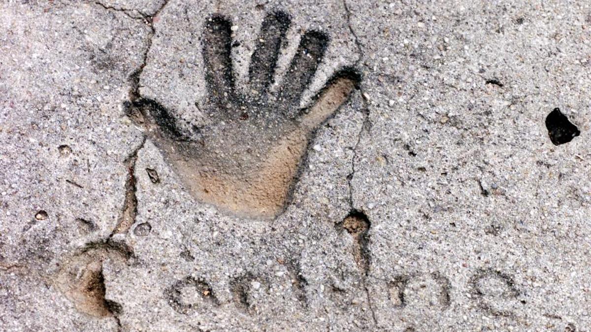 Carlene Tengelsen's hand print at the end of the driveway on Easy Street in Macon, where her family lived in the 1970s.