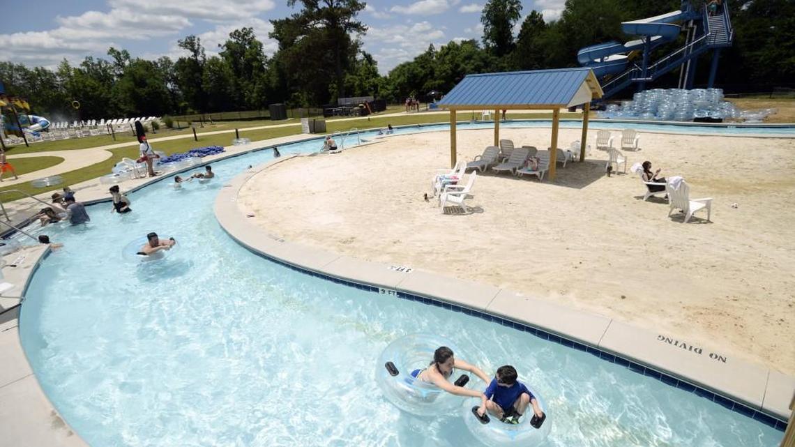 Guests cool off in the "Lazy River Adventure" at Sandy Beach Water Park on May 22, 2016.