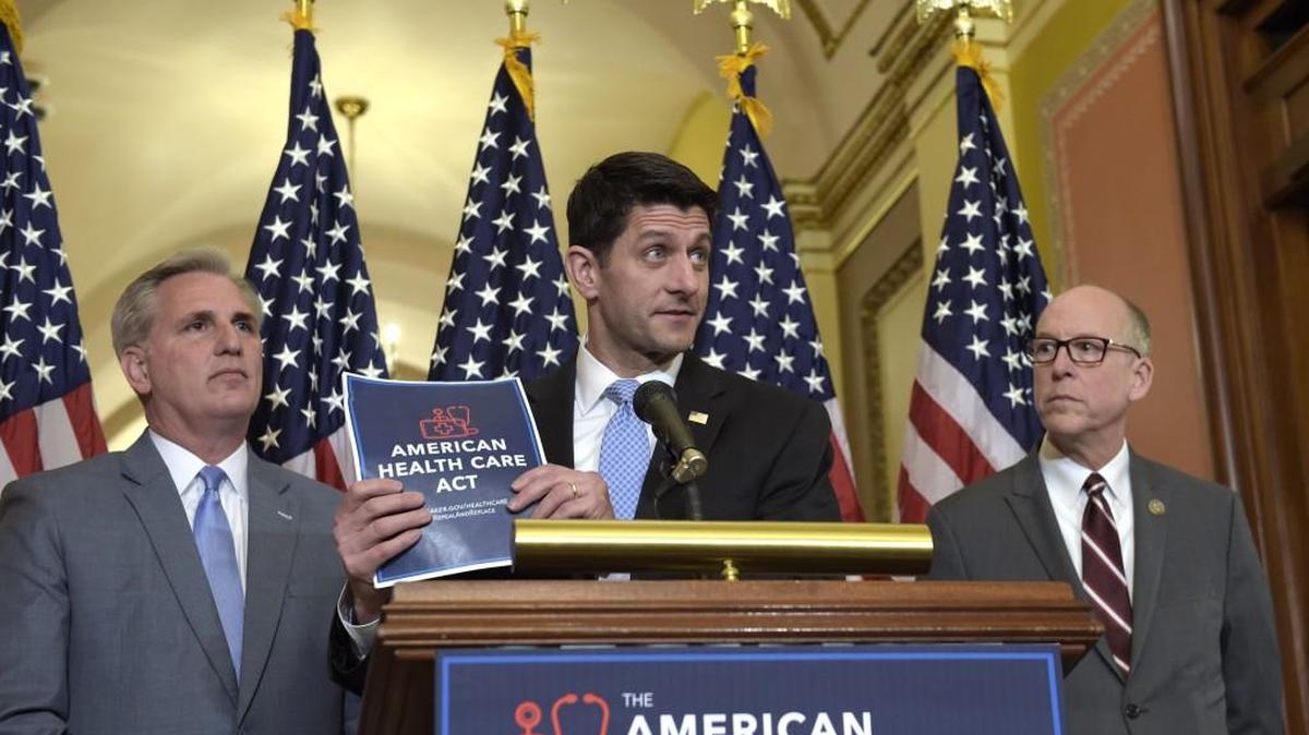 House Speaker Paul Ryan of Wis., center, standing with Energy and Commerce Committee Chairman Greg Walden, R-Ore., right, and House Majority Whip Kevin McCarthy, R-Calif., left, speaks during a news conference on the American Health Care Act on Capitol Hill in Washington, Tuesday, March 7, 2017.
