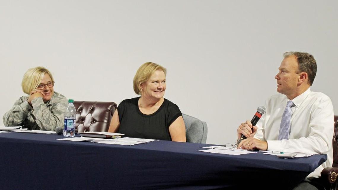 Fred Massey, Air Force Reserve Command deputy director of Information Technology and Communication, speaks at a panel discussion on contracting at the Museum of Aviation on Wednesday. Panelists with him were Lt. Col. Michelle Crawford, left, acquistion attorney at AFRC, and Barbara Kuklinski, director of contracting at AFRC.