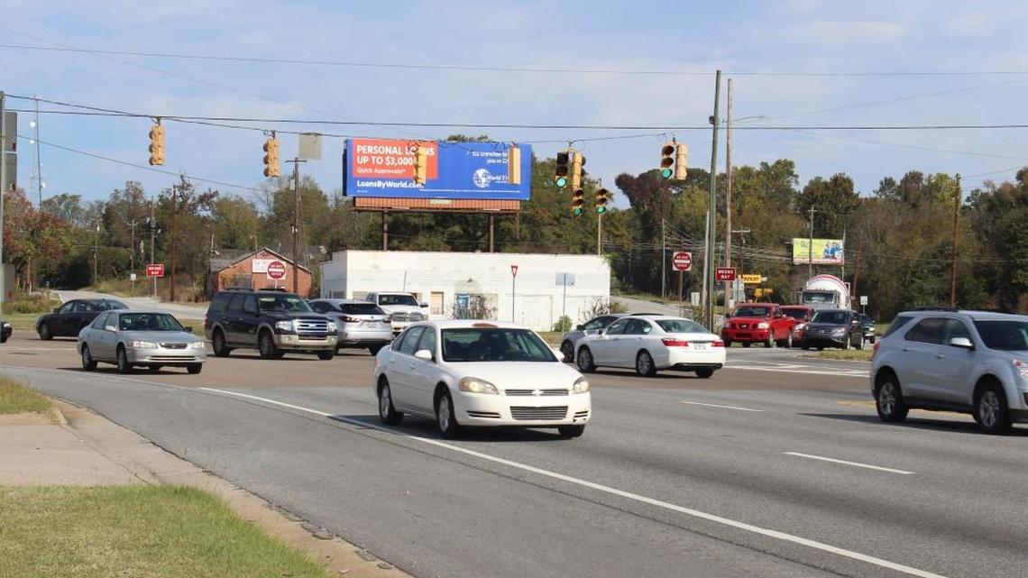 Traffic moves through the intersection of Pio Nono Avenue, Broadway, Houston Avenue and Houston Road, where the Georgia Department of Transportation believes a roundabout would improve safety.